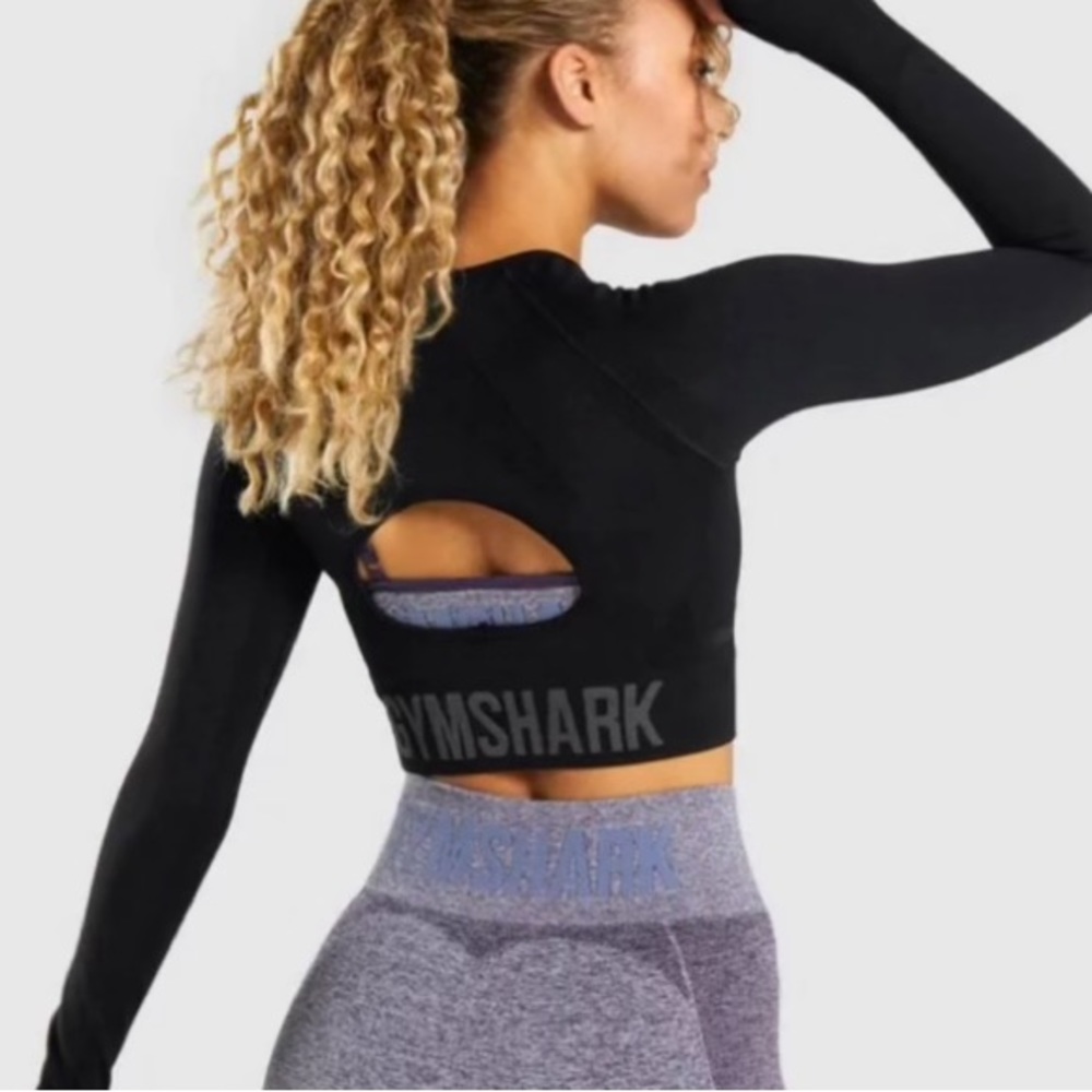 Black Gymshark cropped workout top. Cutout on back. Size Small.